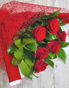 Dose of red roses with a bunch of greenery