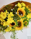 Yellow bouquet of flowers with sunflowers 