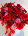 Red roses in round box. Truganina florist
